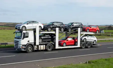 Multi-level car carrier on the motorway to Llanelli, Dyfed, United Kingdom