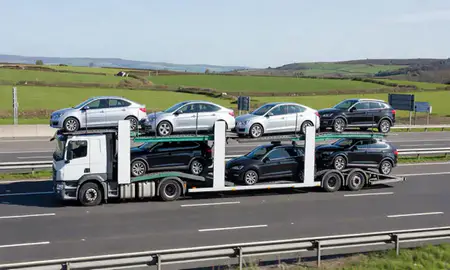 Multi-level car carrier on the motorway to East Ayrshire, United Kingdom