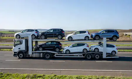 Multi-level car carrier on the motorway to Kilmarnock, East Ayrshire, United Kingdom