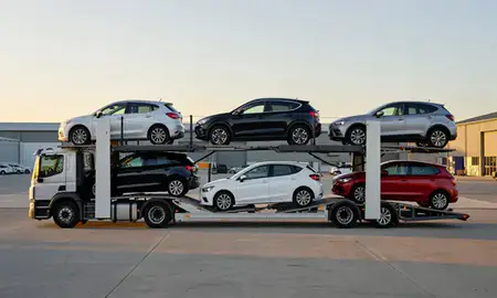 Car transporter parked in an industrial area of Kilmarnock, East Ayrshire, United Kingdom