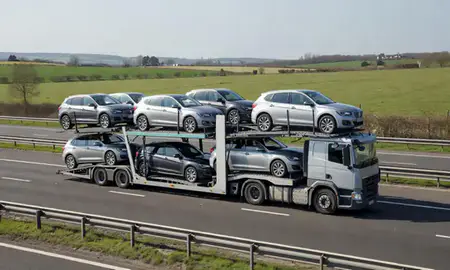 Multi-level car carrier on the motorway to East Riding of Yorkshire, United Kingdom