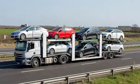 Multi-level car carrier on the motorway to Kingston upon Hull, East Riding of Yorkshire, United Kingdom
