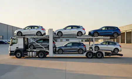 Car transporter parked in an industrial area of Eastbourne, East Sussex, United Kingdom