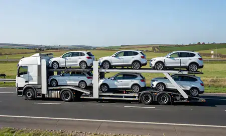 Multi-level car carrier on the motorway to Hastings, East Sussex, United Kingdom