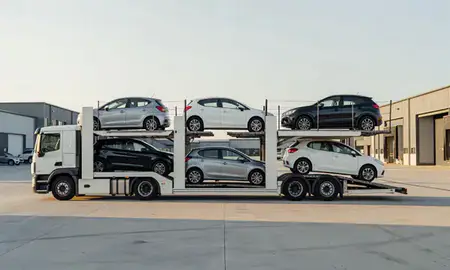 Car transporter parked in an industrial area of Hastings, East Sussex, United Kingdom