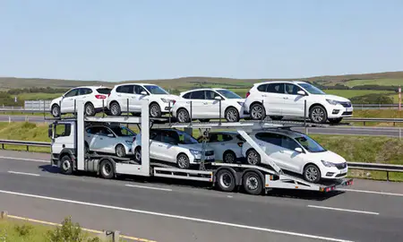 Multi-level car carrier on the motorway to Edinburgh, United Kingdom