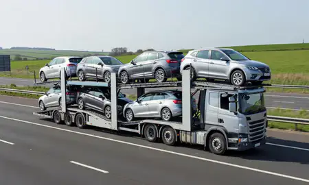 Multi-level car carrier on the motorway to Essex, United Kingdom