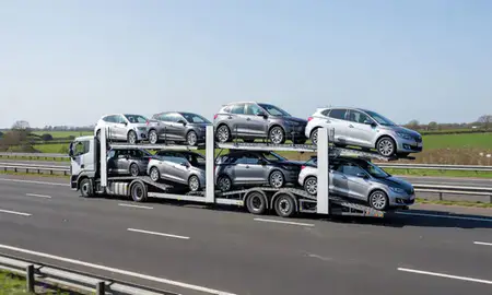 Multi-level car carrier on the motorway to Braintree, Essex, United Kingdom