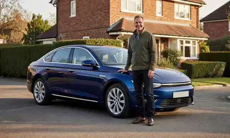Customer with their delivered car in Braintree, Essex, United Kingdom