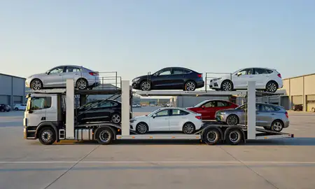 Car transporter parked in an industrial area of Brentwood, Essex, United Kingdom
