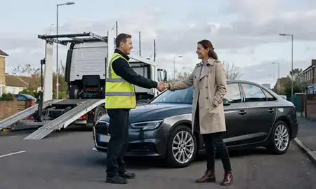 Vehicle owner beside their delivered car in Colchester, Essex, United Kingdom