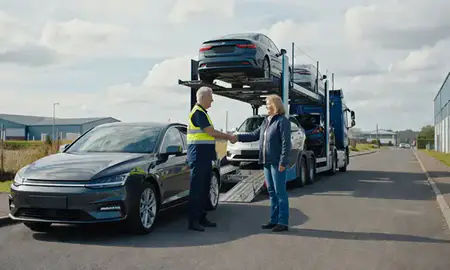 Vehicle owner beside their delivered car in Grays, Essex, United Kingdom