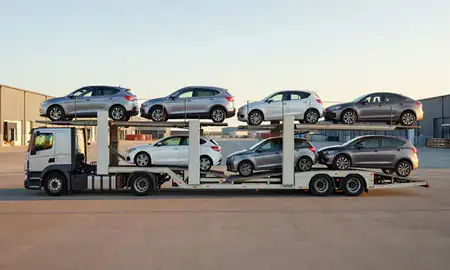 Car transporter parked in an industrial area of Grays, Essex, United Kingdom