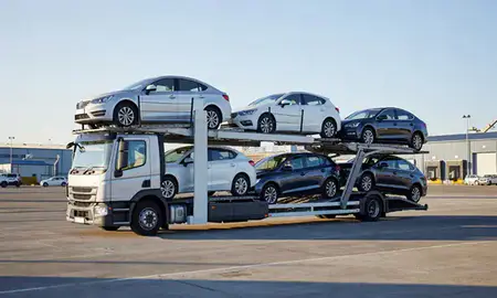 Car transporter loaded with vehicles in Grays, Essex, United Kingdom