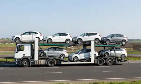 Multi-level car carrier on the motorway to Rayleigh, Essex, United Kingdom