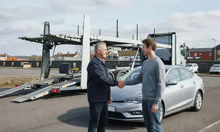 Vehicle owner beside their delivered car in Falkirk, United Kingdom