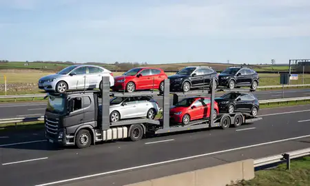 Multi-level car carrier on the motorway to Dunfermline, Fife, United Kingdom
