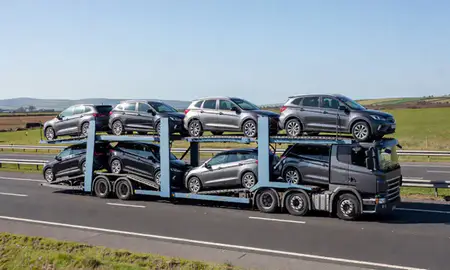 Multi-level car carrier on the motorway to Kirkcaldy, Fife, United Kingdom
