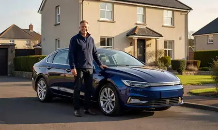 Customer with their delivered car in Kirkcaldy, Fife, United Kingdom