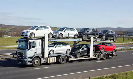 Multi-level car carrier on the motorway to Glasgow, United Kingdom