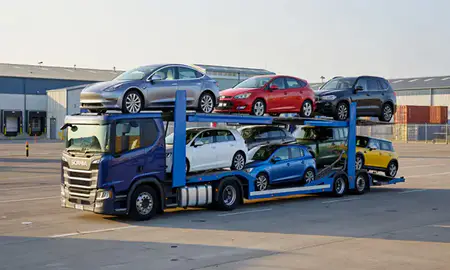 Car transporter loaded with vehicles in Glasgow, United Kingdom
