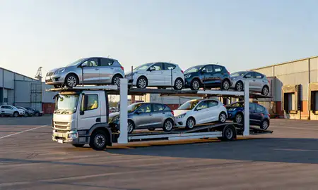 Car transporter loaded with vehicles in Cheltenham, Gloucestershire, United Kingdom