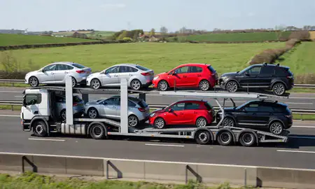 Multi-level car carrier on the motorway to Filton, Gloucestershire, United Kingdom