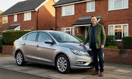 Customer with their delivered car in Greater Manchester, United Kingdom