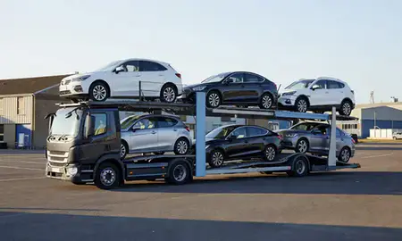 Car transporter loaded with vehicles in Greater Manchester, United Kingdom