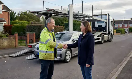 Vehicle owner beside their delivered car in Altrincham, Greater Manchester, United Kingdom