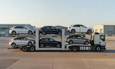 Car transporter parked in an industrial area of Bolton, Greater Manchester, United Kingdom