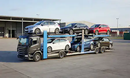 Car transporter loaded with vehicles in Bolton, Greater Manchester, United Kingdom