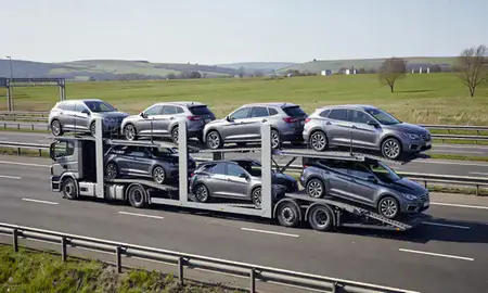 Multi-level car carrier on the motorway to Bury, Greater Manchester, United Kingdom
