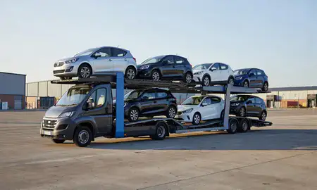 Car transporter loaded with vehicles in Bury, Greater Manchester, United Kingdom