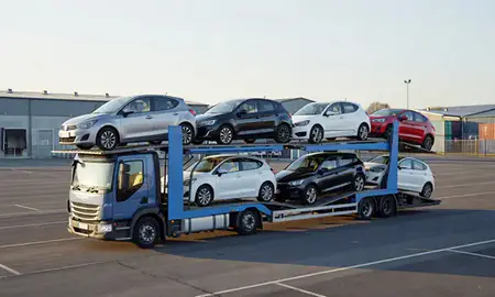 Car transporter loaded with vehicles in Chadderton, Greater Manchester, United Kingdom