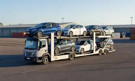 Car transporter loaded with vehicles in Denton, Greater Manchester, United Kingdom