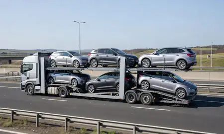 Multi-level car carrier on the motorway to Eccles, Greater Manchester, United Kingdom
