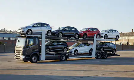 Car transporter loaded with vehicles in Stockport, Greater Manchester, United Kingdom