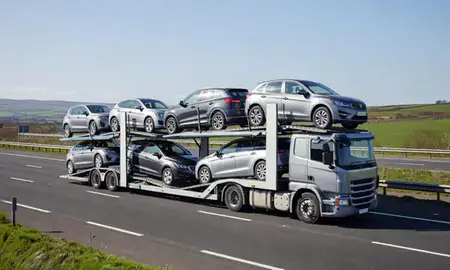 Multi-level car carrier on the motorway to Caerphilly, Gwent, United Kingdom