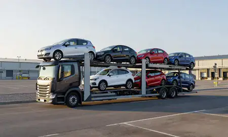 Car transporter loaded with vehicles in Cwmbrân, Gwent, United Kingdom