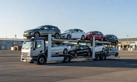 Car transporter loaded with vehicles in Hampshire, United Kingdom