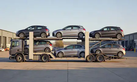 Car transporter parked in an industrial area of Aldershot, Hampshire, United Kingdom