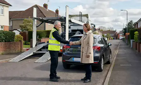 Vehicle owner beside their delivered car in Eastleigh, Hampshire, United Kingdom