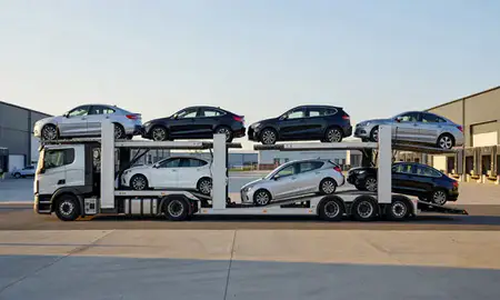 Car transporter parked in an industrial area of Fareham, Hampshire, United Kingdom