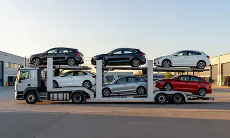 Car transporter parked in an industrial area of Farnborough, Hampshire, United Kingdom