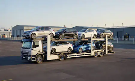 Car transporter loaded with vehicles in Farnborough, Hampshire, United Kingdom
