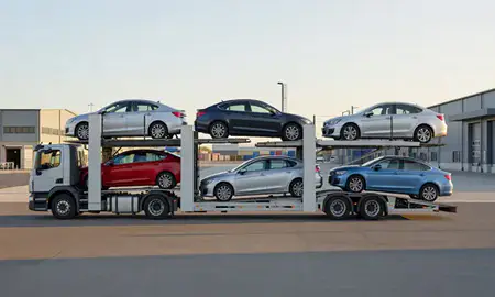 Car transporter parked in an industrial area of Fleet, Hampshire, United Kingdom