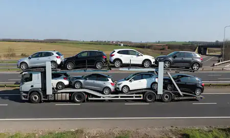 Multi-level car carrier on the motorway to Havant, Hampshire, United Kingdom