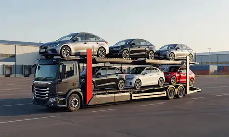 Car transporter loaded with vehicles in Horndean, Hampshire, United Kingdom