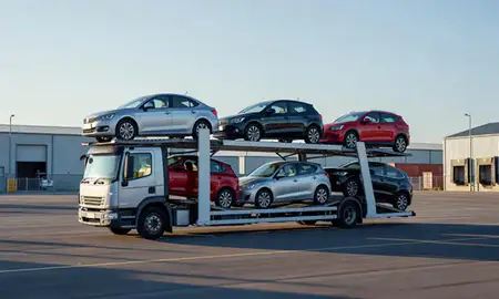 Car transporter loaded with vehicles in Portsmouth, Hampshire, United Kingdom